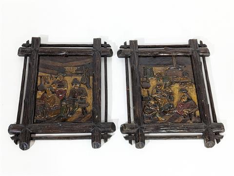 Zwei Reliefbilder mit bäuerlichen Motiven aus Gusseisen im Holzrahmen